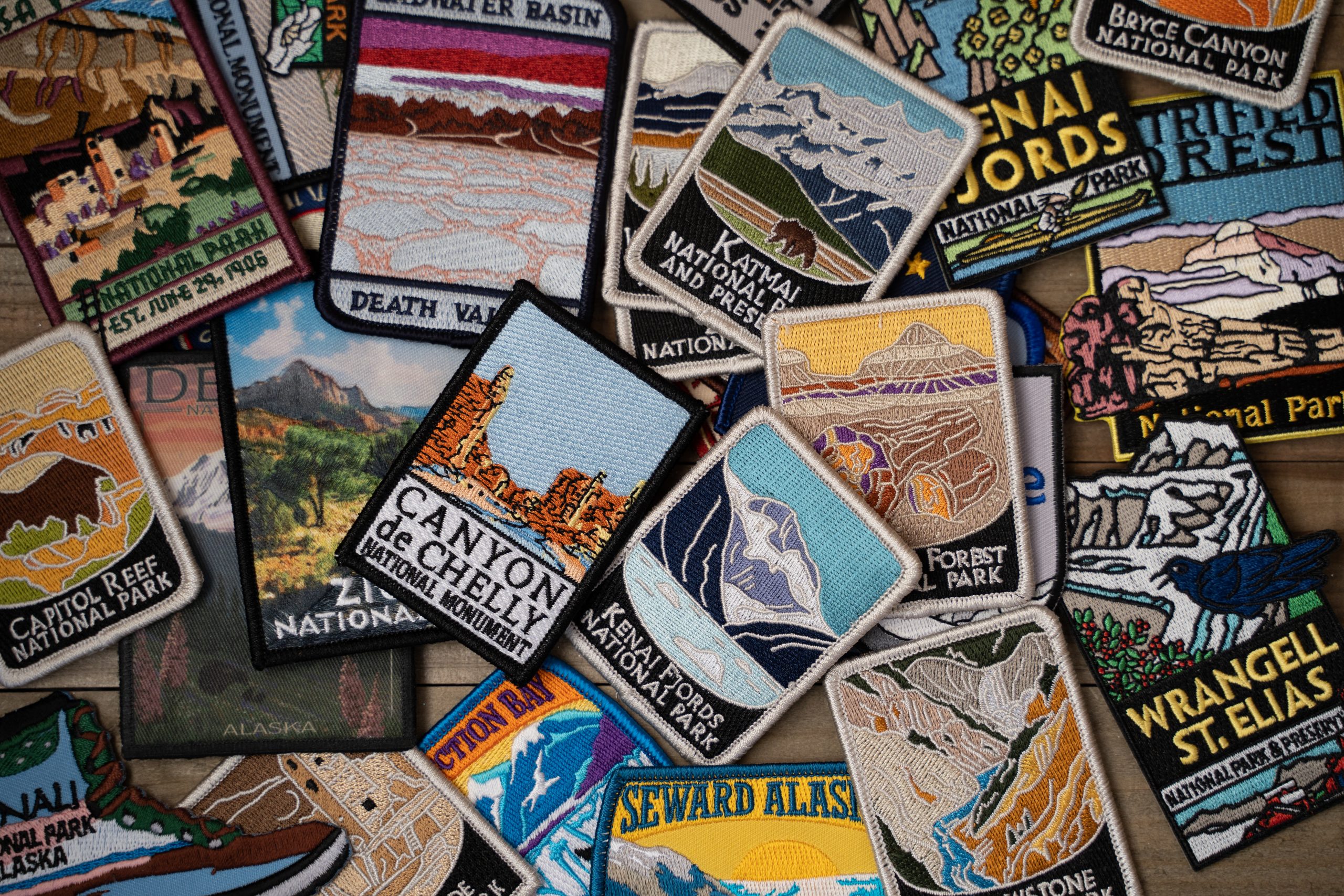 Feb 24, 2019 - Maple Grove, MN: Flatlay arrangement of various USA United States National Parks and monuments patches from gift shops. Concept for USA travel